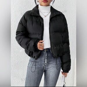 Nice and new looking black jacket. Wonderful for fall and cute with blue jeans
